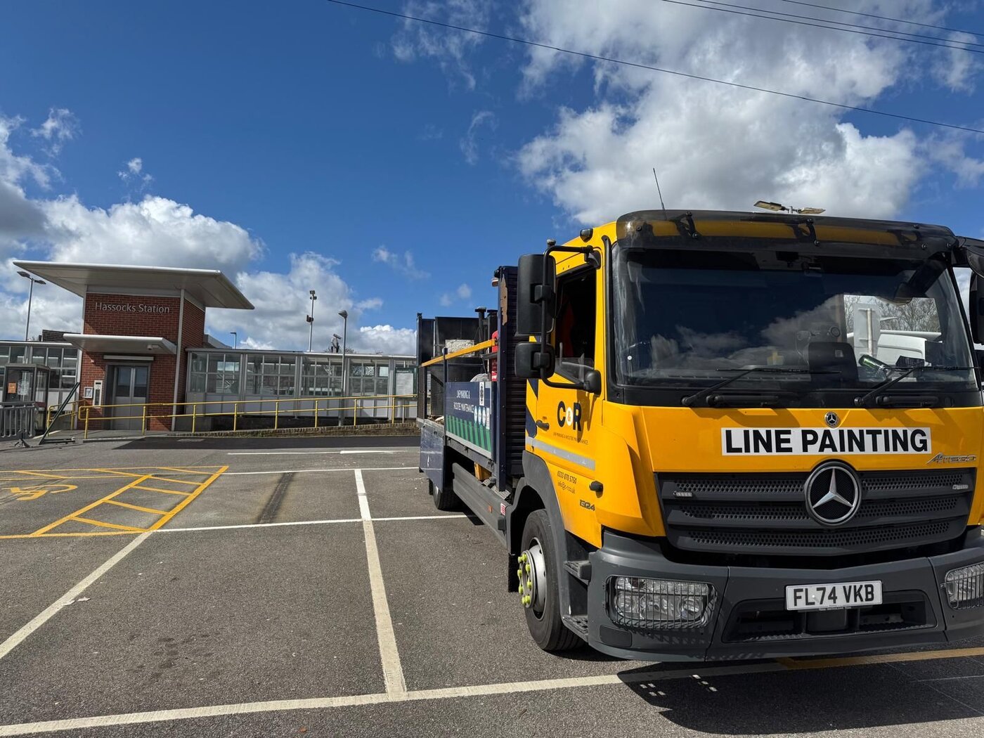 C&R line painting lorry on a freshly marked station car park
