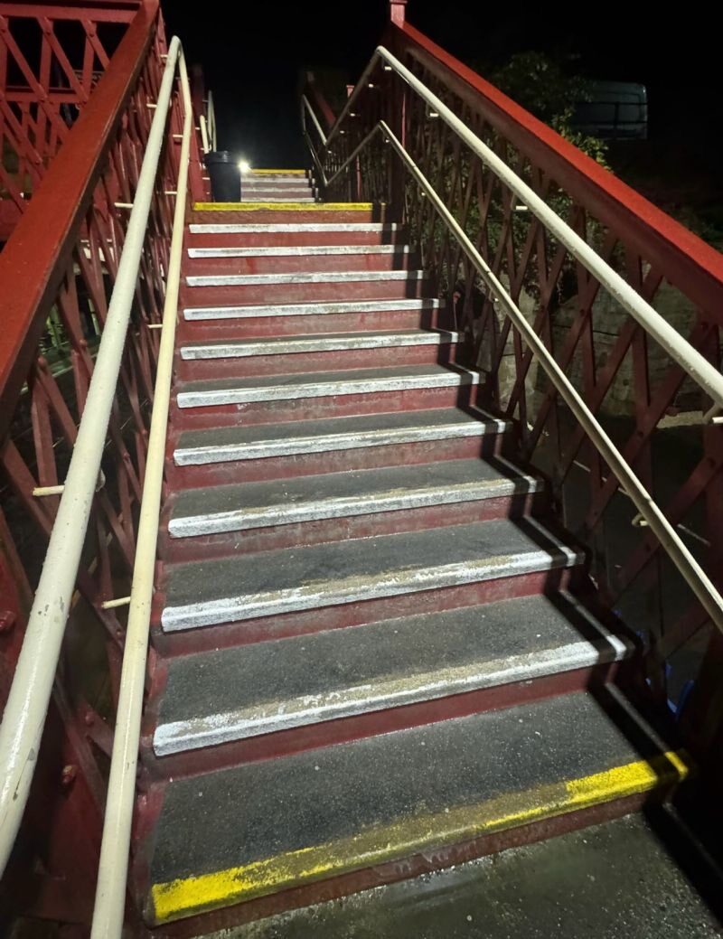 Repainted platform step edges at a Northumberland train station