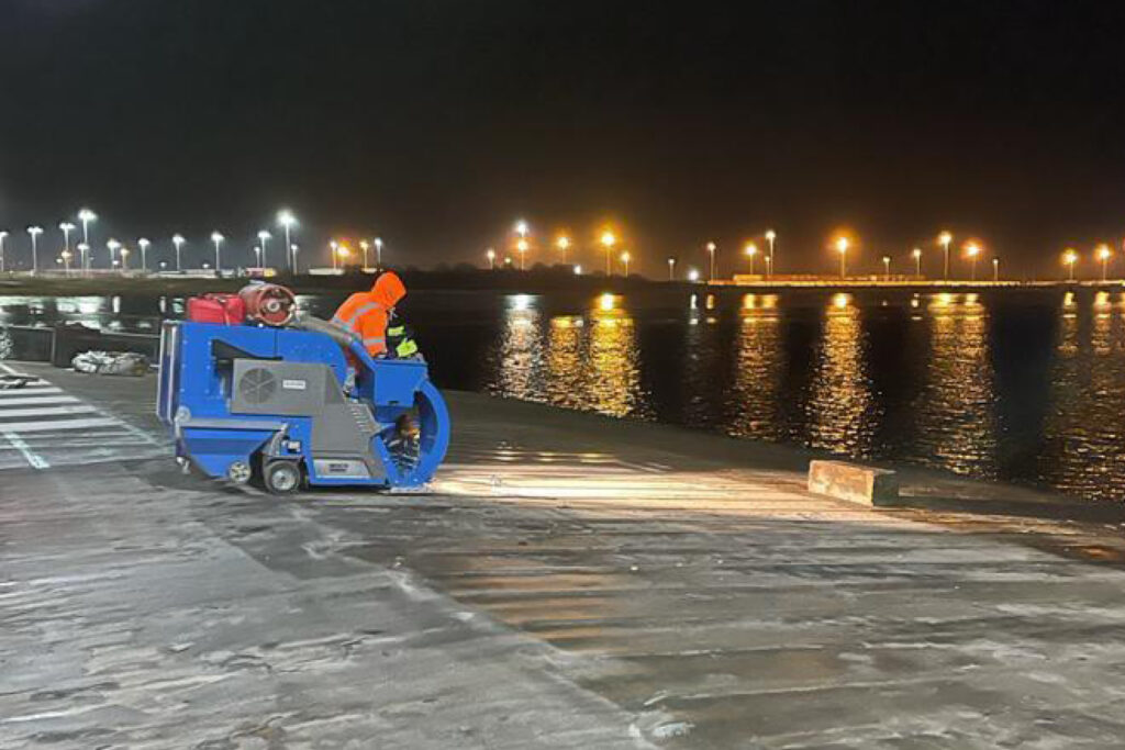 Hydro blasting concrete at night