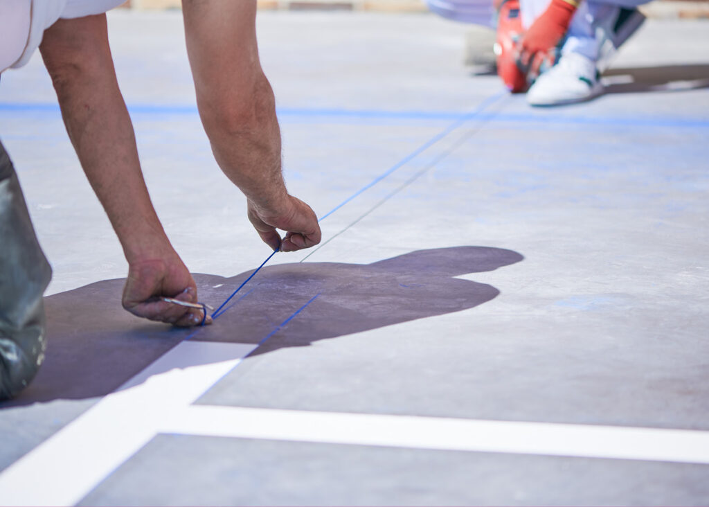 Surface preparation for road markings